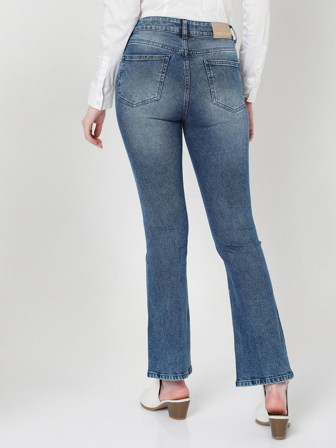 Mid Rise Ripped Bootcut Jeans