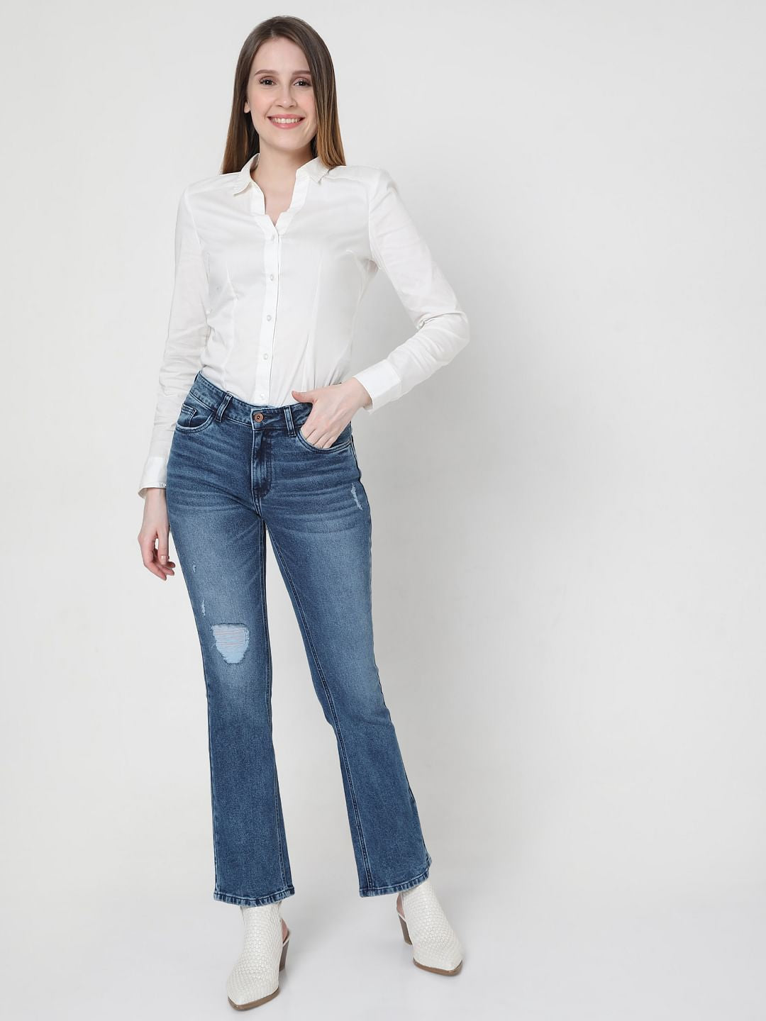 Mid Rise Ripped Bootcut Jeans