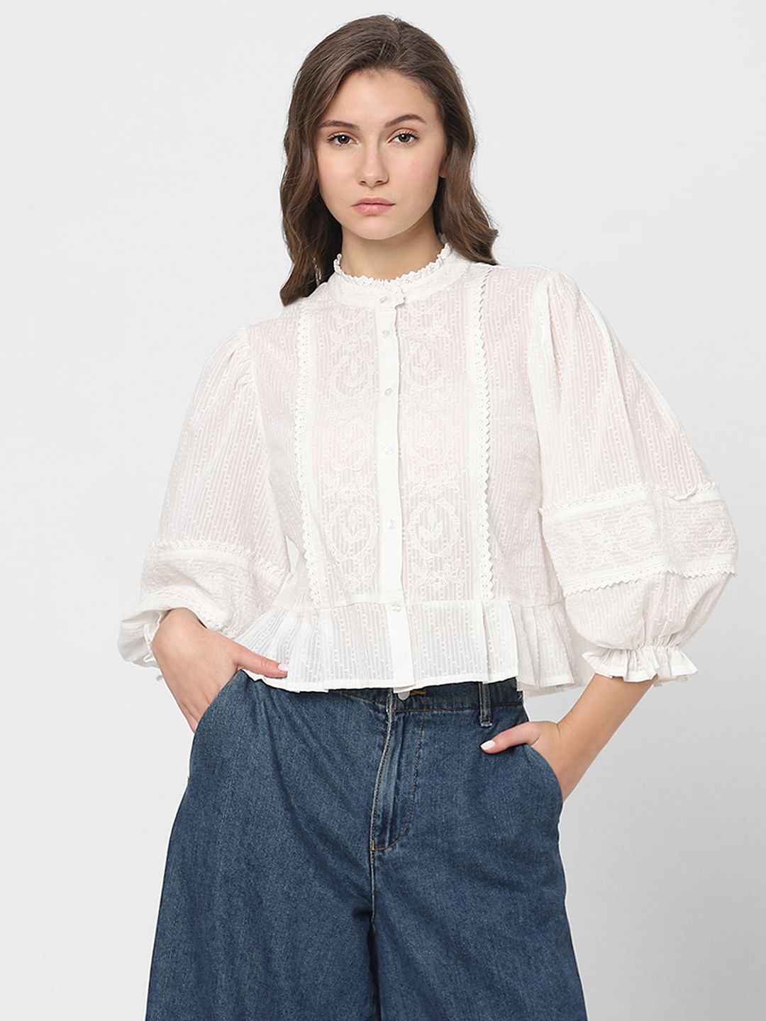 White Embroidered Peplum Top