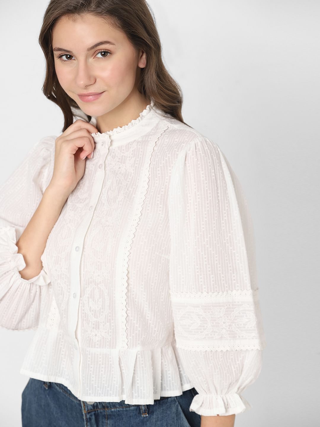 White Embroidered Peplum Top