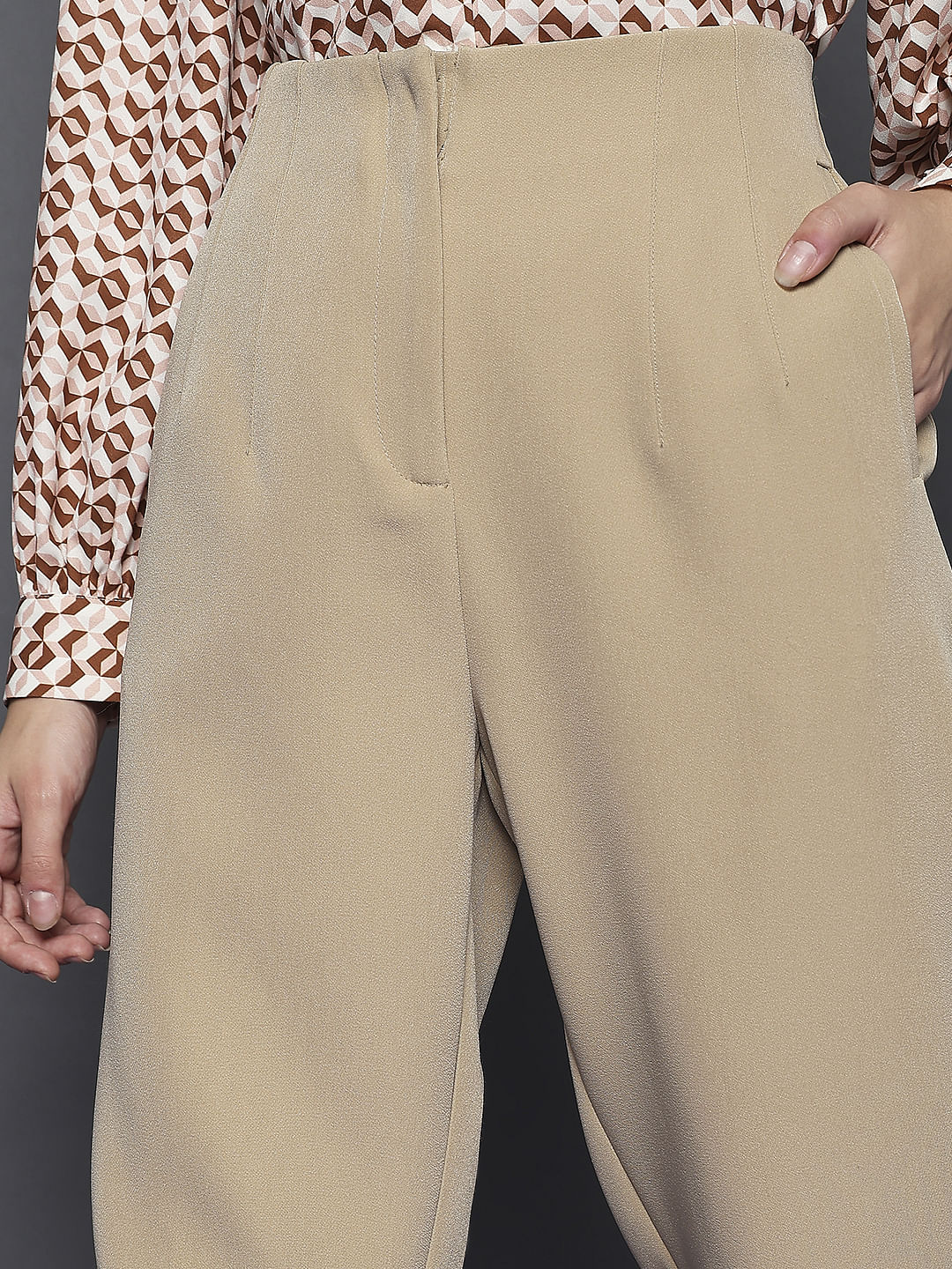 Beige High Rise Tapered Fit Pants