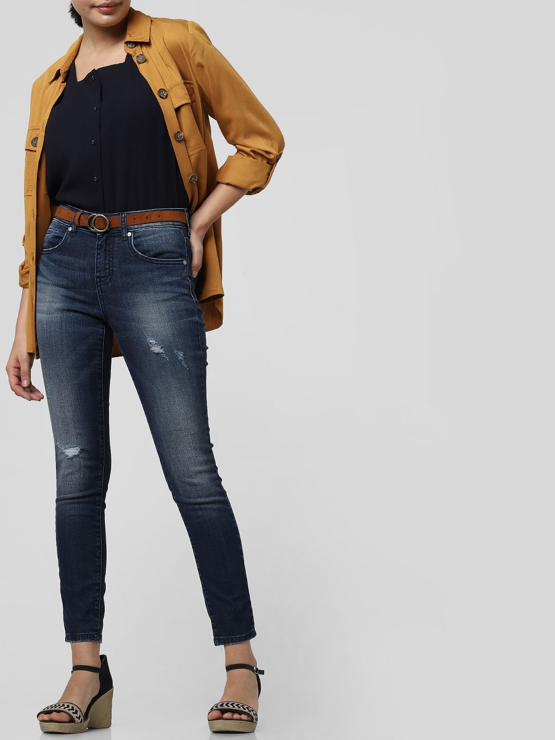 Blue Mid Rise Distressed Skinny Jeans