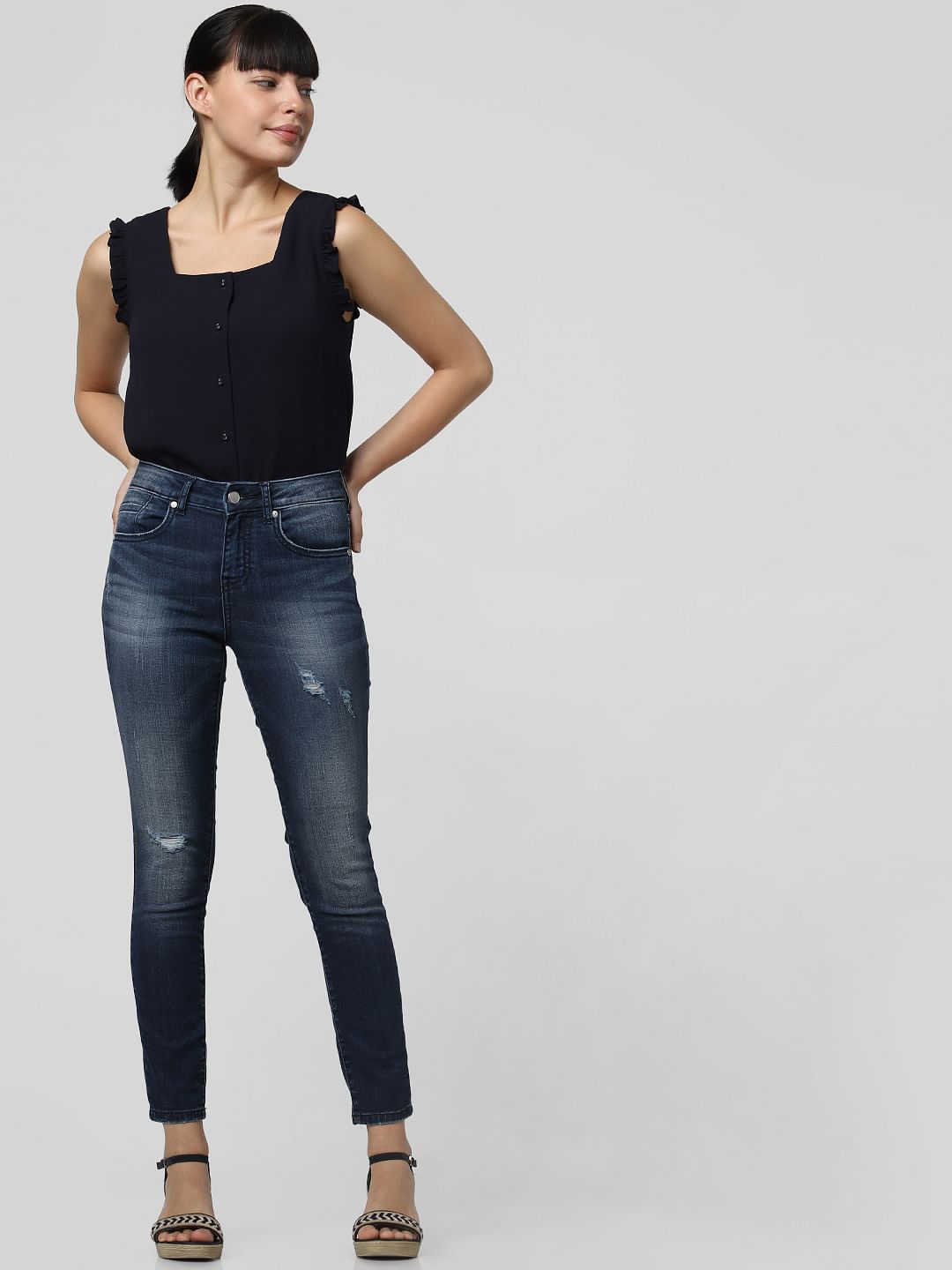 Blue Mid Rise Distressed Skinny Jeans