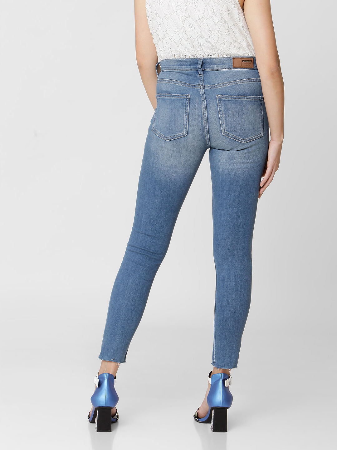 Blue Mid Rise Mildly Distressed Skinny Jeans
