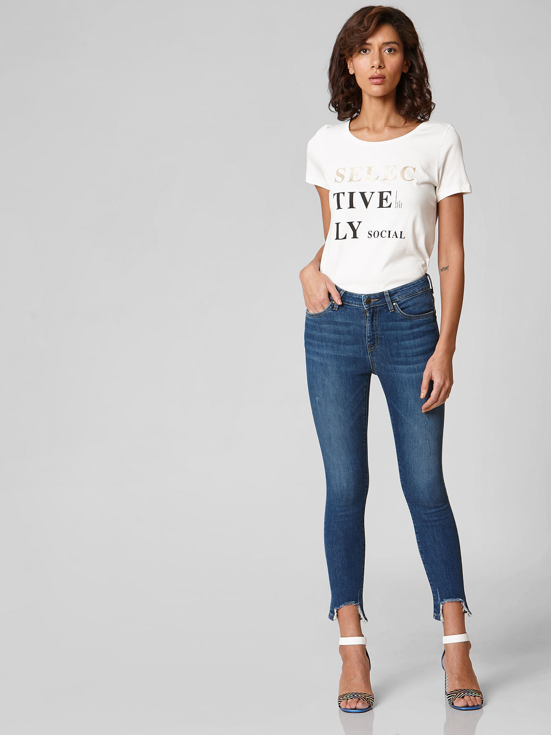 Blue Mid Rise Distressed Hem Skinny Jeans