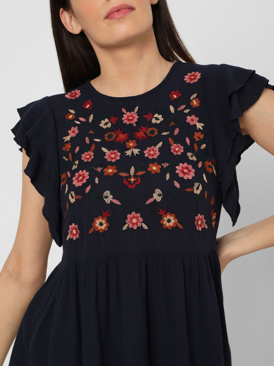 Blue Embroidered Peplum Top