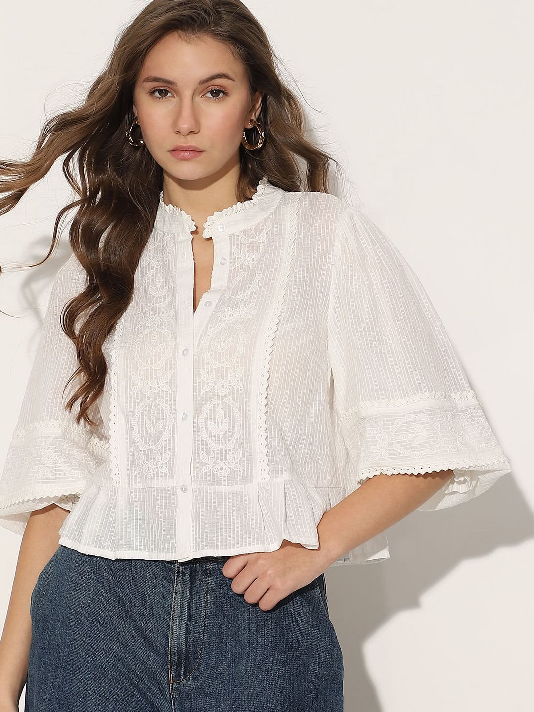 White Embroidered Peplum Top