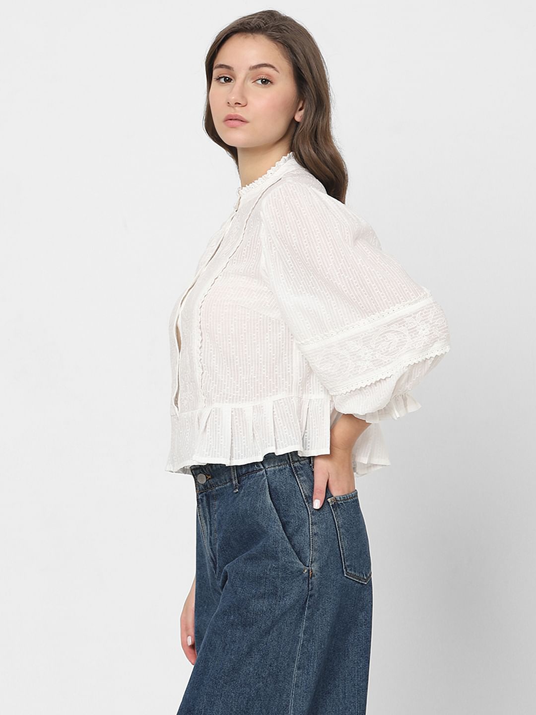 White Embroidered Peplum Top