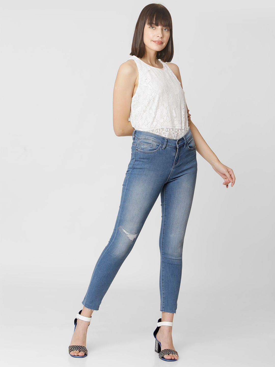 Blue Mid Rise Mildly Distressed Skinny Jeans