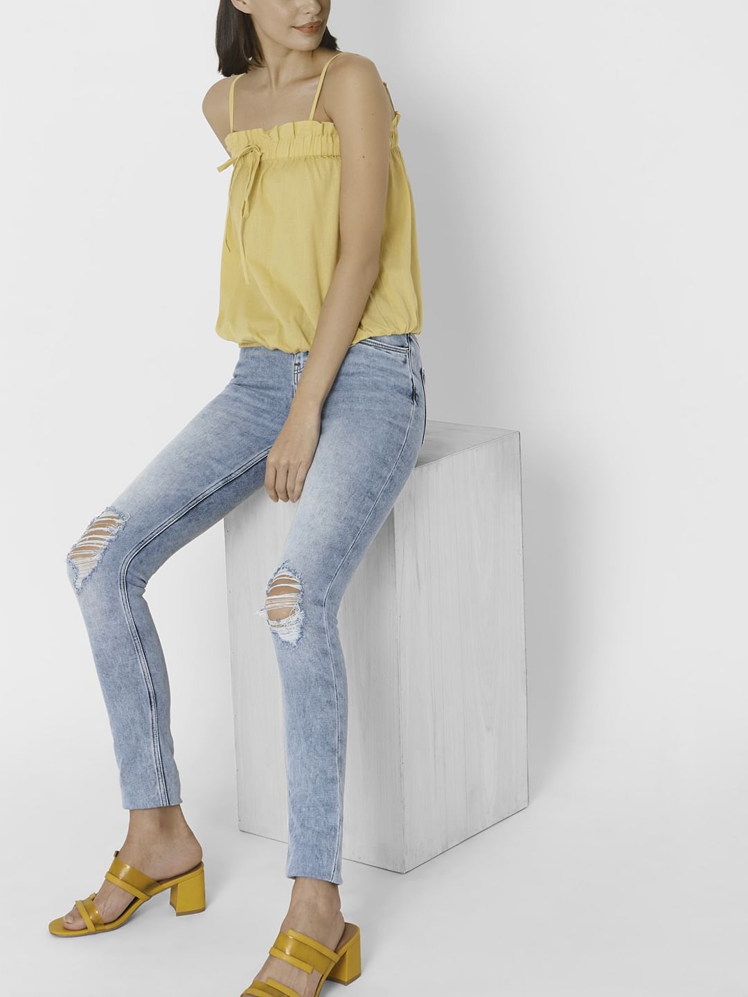Light Blue Mid Rise Ripped Skinny Jeans