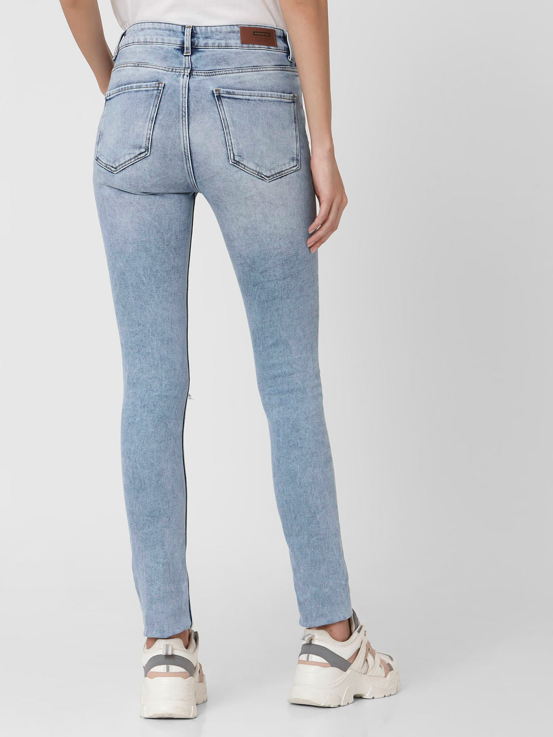 Light Blue Mid Rise Ripped Skinny Jeans