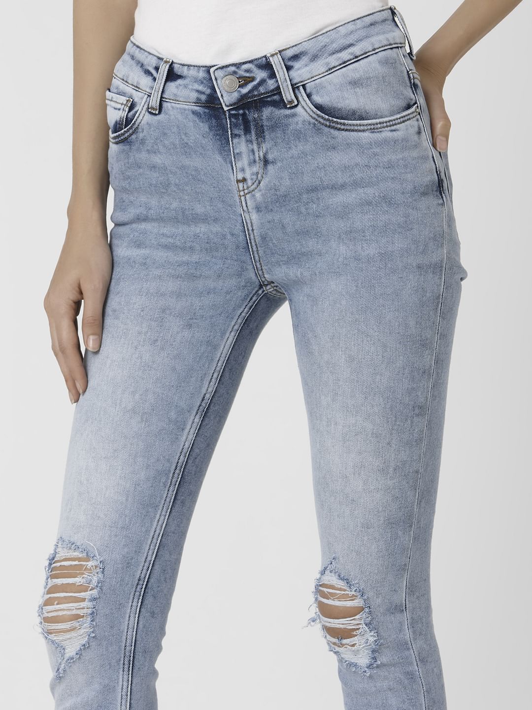 Light Blue Mid Rise Ripped Skinny Jeans