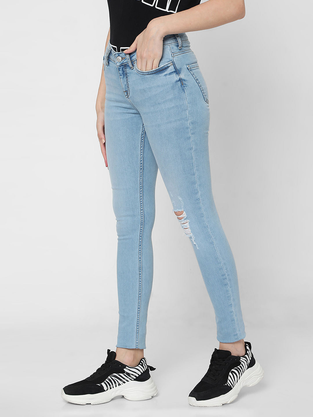 Light Blue Mid Rise Distressed Skinny Jeans