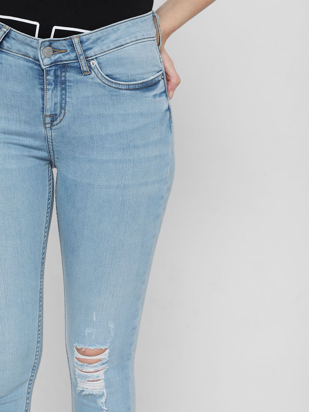 Light Blue Mid Rise Distressed Skinny Jeans