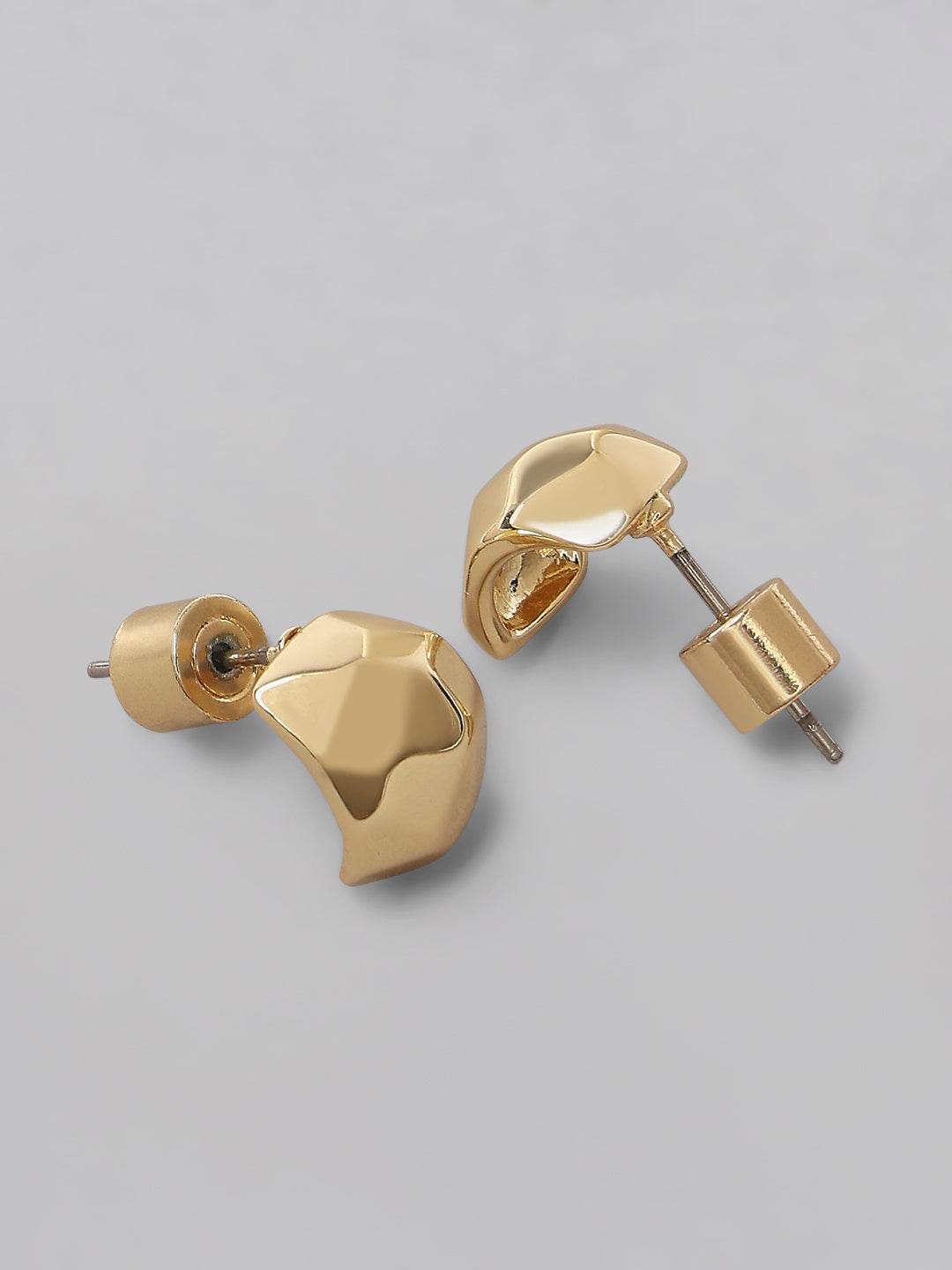Golden sculpted stud earrings