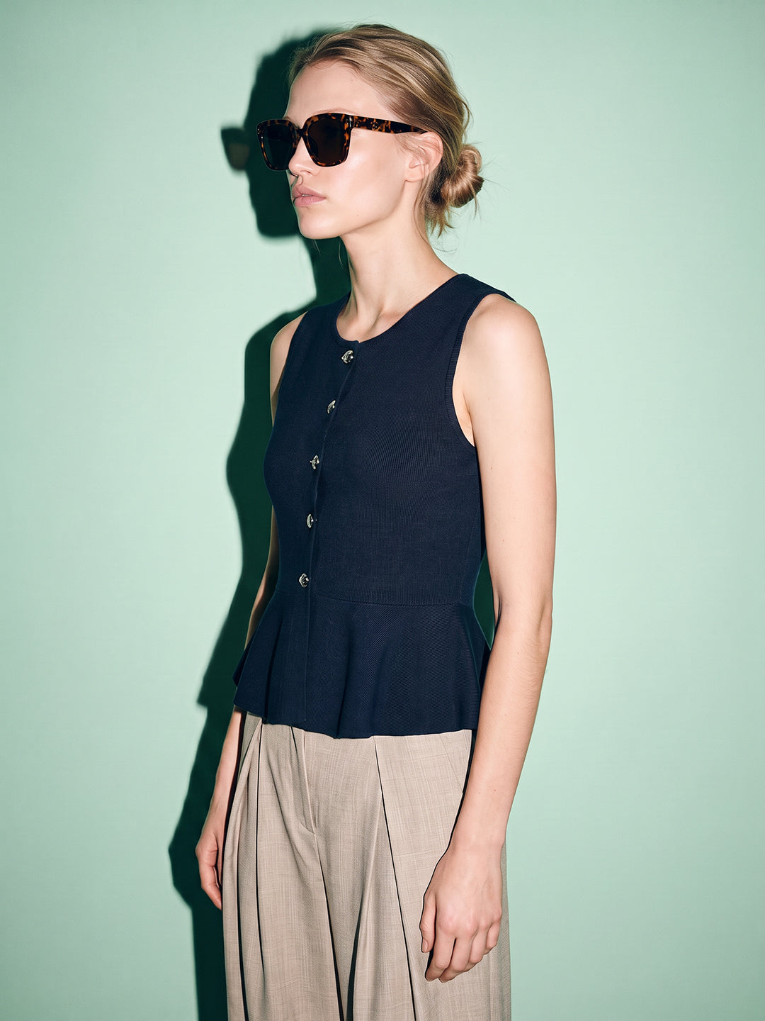 Sleeveless Peplum Knit Top