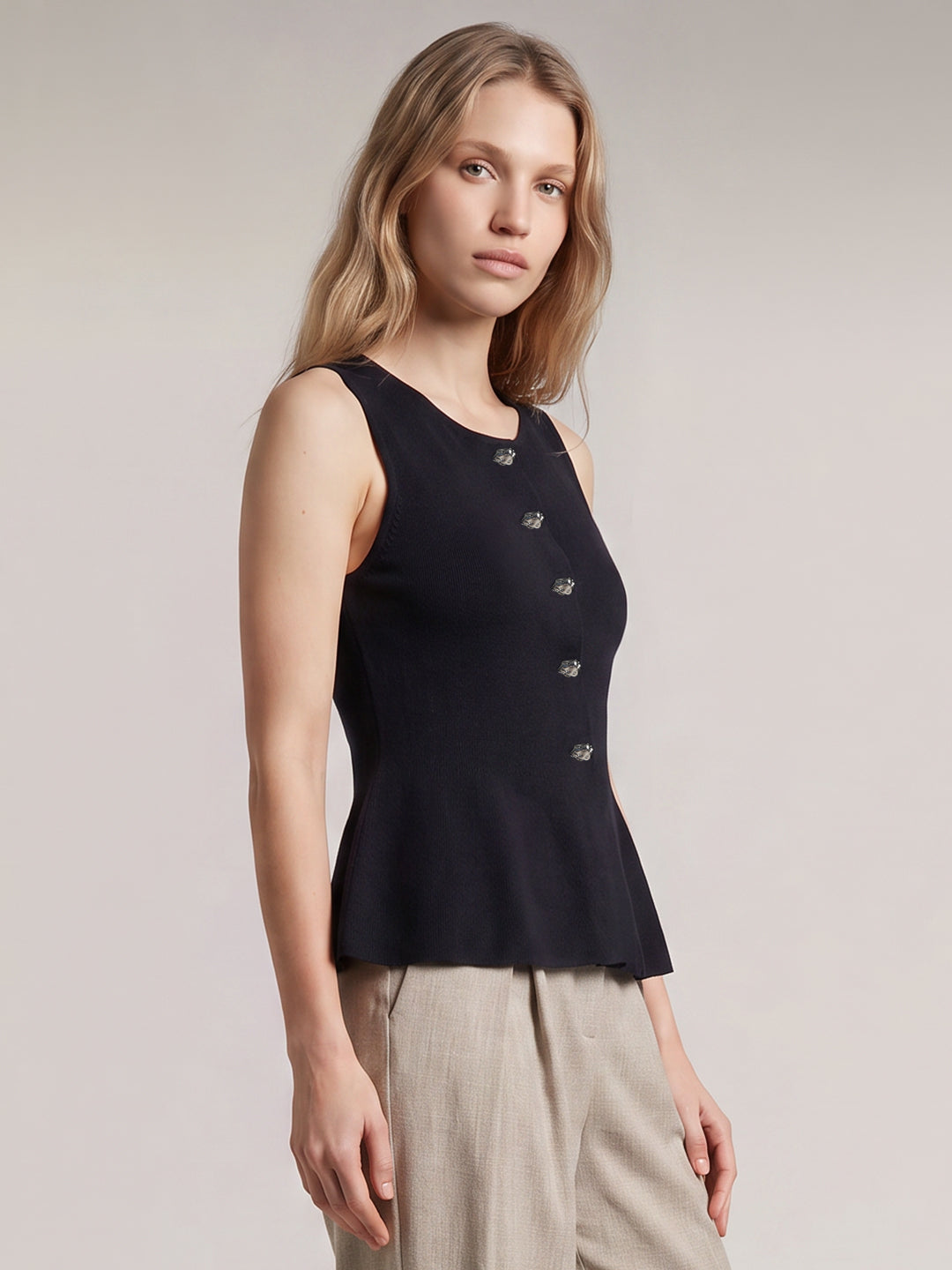 Sleeveless Peplum Knit Top