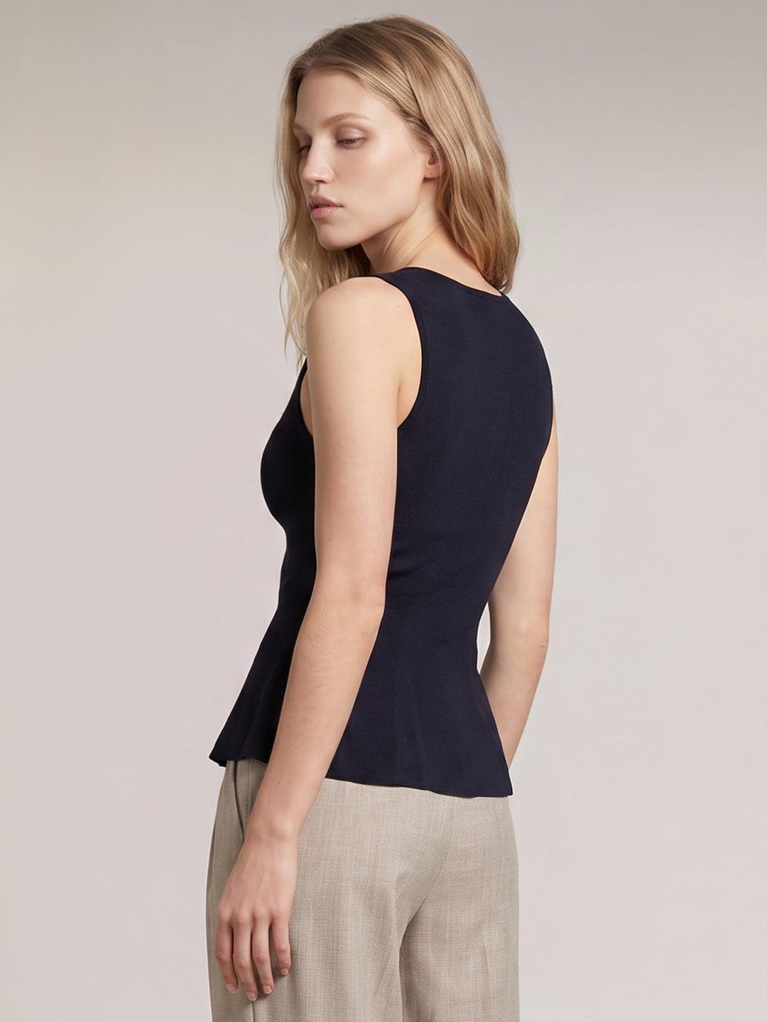Sleeveless Peplum Knit Top