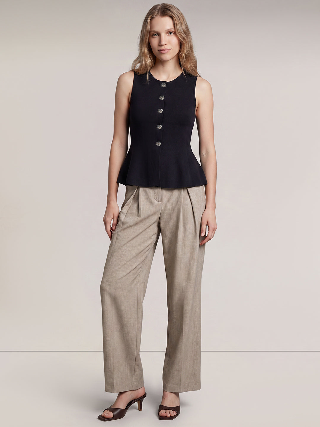Sleeveless Peplum Knit Top