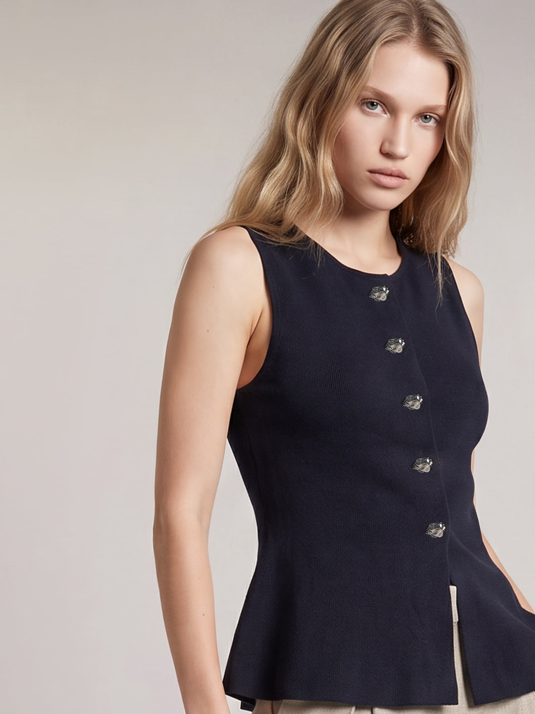 Sleeveless Peplum Knit Top